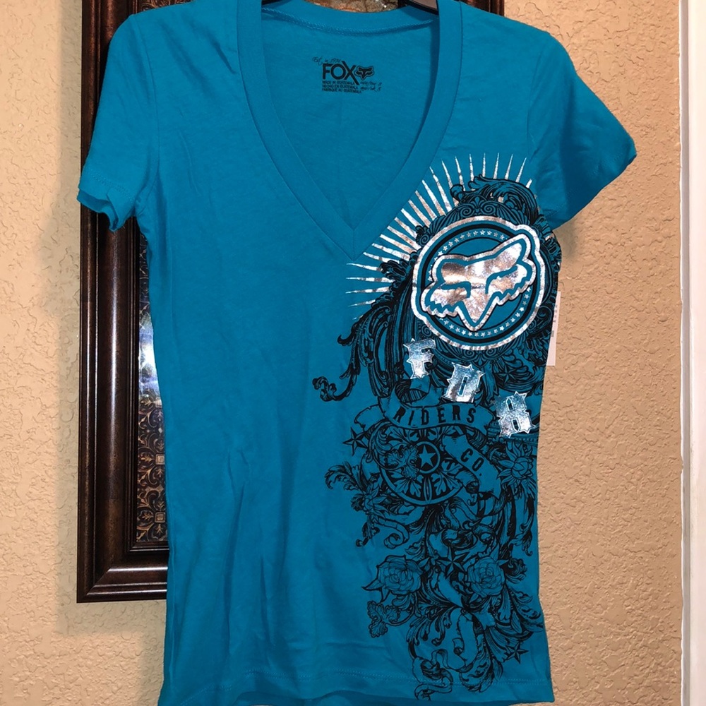 NWT FOX Riders Vintage V Neck T Shirt. Size Small.  Silver metallic design. Teal